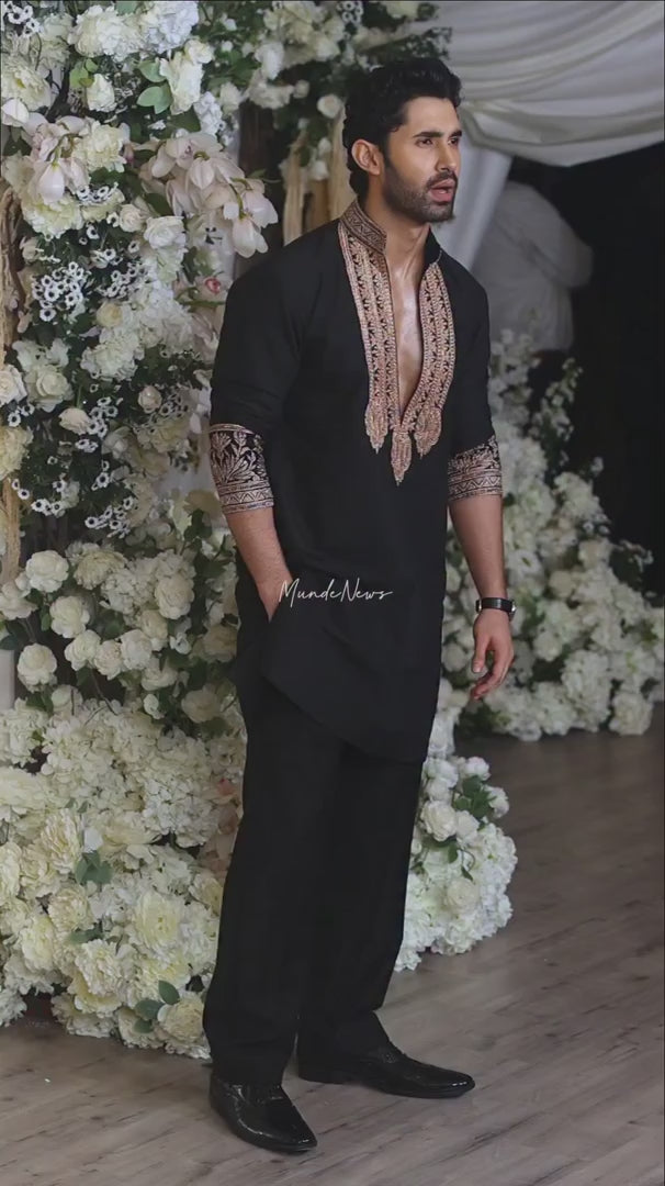 Black & Gold Celebrities Tilla Placket Kurta Pajama Set by designer Manish Malhotra