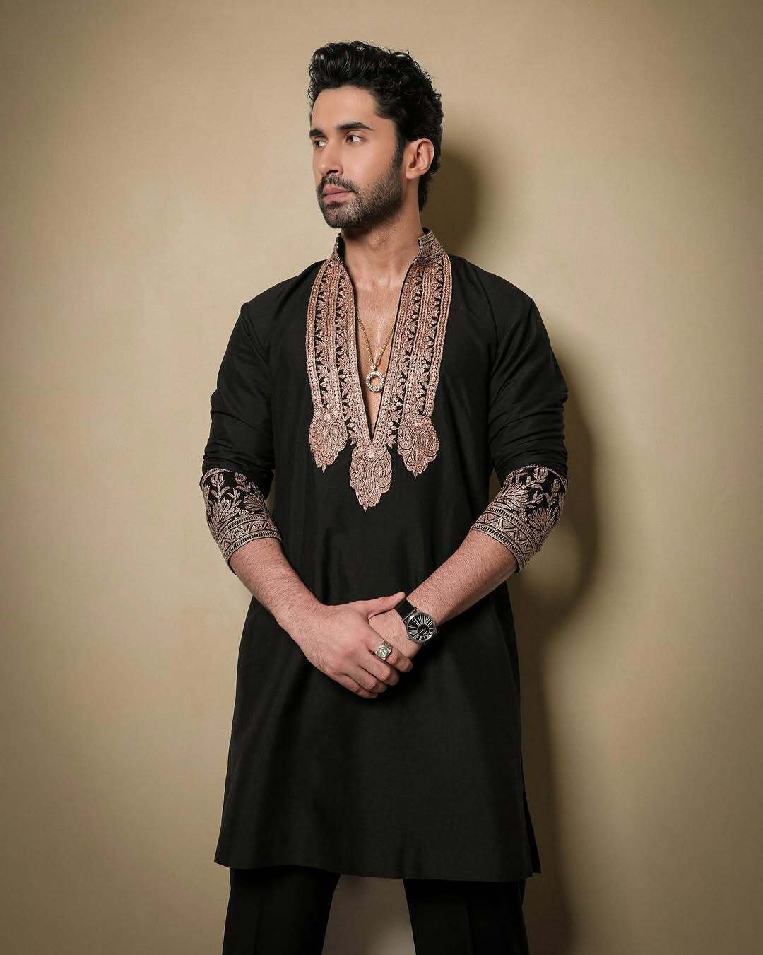 Black & Gold Celebrities Tilla Placket Kurta Pajama Set by designer Manish Malhotra